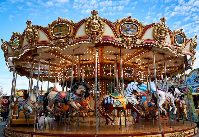 carousel horse details in an amusement park